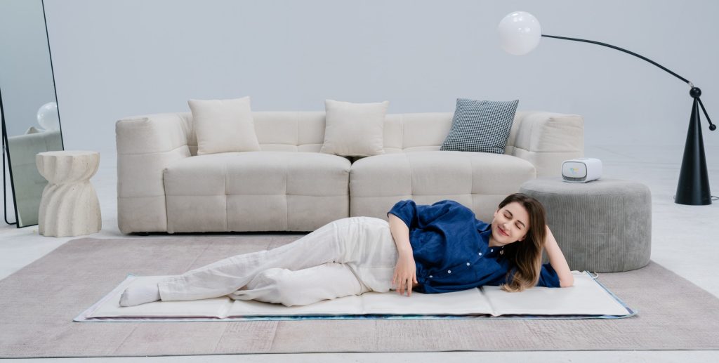Lie on the Magic Pro Mat on the Floor
